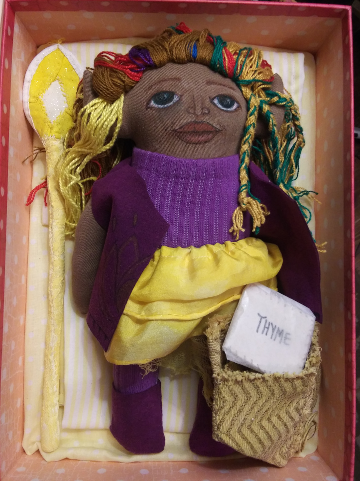 Ella Prunella cloth doll with a pleated bag and pleated staff top