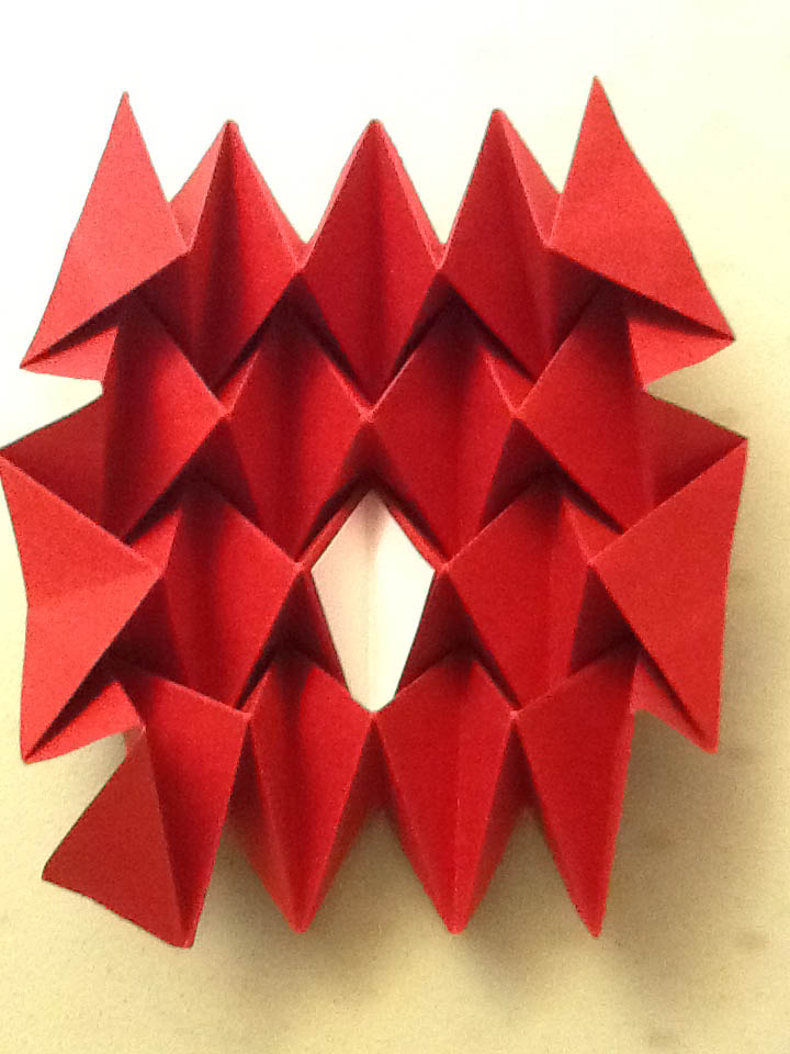 Red Reflexive Glide Form folded by Patrica C. Coleman